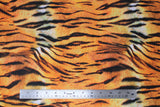 Flat swatch tiger print fabric (white/orange fabric with black tiger stripes and fur look texture)