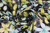 Swirled swatch swatch Black fabric (black fabric with busy tossed pointy floral heads and leaves in blue, green and grey)