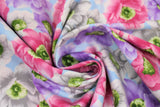 Swirled swatch Pink/Purple/White fabric (sky blue fabric with tossed large floral heads in white, pink, and purple with green and yellow centers)