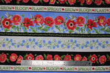 Flat swatch poppie meadows fabric (medium thick black stripes with red poppies and greenery, thin white stripe with "Sprout" "Grow" etc. text in green, thick sky stripe with poppies and blue floral and hummingbirds, floral stripes)