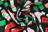Swirled swatch socks fabric (black fabric with tossed Christmas socks and stockings allover in various styles/colours in red, green, white, grey with candy canes, trees, deer, etc. patterns)