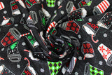 Swirled swatch hot drinks fabric (black fabric with tossed coffee cups, coffee mugs, tea cups, etc. with hot drinks and Christmas decorated mugs and cups in red, green, white, with candy canes and tossed white snowflakes allover)