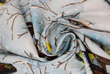 Swirled swatch snowy birdhouse fabric (white and light blue marbled snowy sky look fabric with tossed brown snow covered birdhouses with yellow birds and snow covered branches throughout)