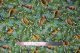 Flat swatch cedarwax fabric (light blue fabric with tossed branches with greenery allover some snow covered with blue berries allover and tossed yellow, brown, grey colourway birds)