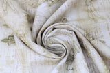 Swirled swatch assorted Leonardo Da Vinci collection fabric in antique (natural/off white coloured fabric with pale gold/brown Da Vinci sketches and text)