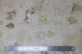 Flat swatch assorted Leonardo Da Vinci collection fabric in antique (natural/off white coloured fabric with pale gold/brown Da Vinci sketches and text)