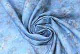 Swirled swatch Leonardo Da Vinci collection fabric in blue (vintage/marbled texture medium blue fabric)
