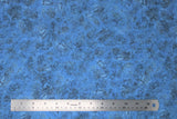 Flat swatch Leonardo Da Vinci collection fabric in blue (vintage/marbled texture medium blue fabric)