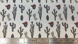 Flat swatch multi cactus style printed fabric in grey (white fabric with assorted size/shape cartoon cacti in grey shades)