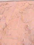 Swatch of medium-pile fake fur in pink