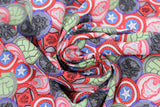 Swirled swatch coins fabric (collaged circular Marvel emblems for Iron Man, Hulk, etc. in full colour)