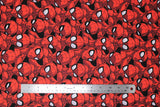 Flat swatch spider sense fabric (black fabric with large tossed spiderman head, neck and shoulders in various poses/eye shapes)