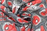 Swirled swatch comic swirl fabric (dark grey fabric with assorted rhombus shaped comic panels with black decorative frames and spiderman heads/necks in various poses and sizes)