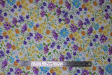 Flat swatch natural layered fabric (off white fabric with tossed layered wildflower floral in yellow, blue, purple, orange floral heads and green stems/leaves)