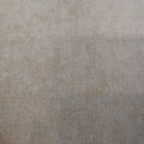 Tan swatch of velvet upholstery fabric