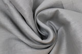 Swirled swatch light grey linen fabric