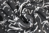 Swirled swatch cat fleece fabric (black fabric with collaged white cat outlines, some with white bowties)