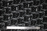 Flat swatch cat fleece fabric (black fabric with collaged white cat outlines, some with white bowties)