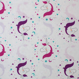 Square swatch Beautiful Unicorn fabric (white fabric with small closed-eyed drawn style unicorns with pink manes and purple manes outlined in pink, purple, and blue stars and hearts making circle shapes around heads)