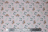 Flat swatch cartoon animals with flower crowns printed fabric on pale pink (deer, bears, bunny)