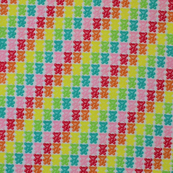 Square swatch Gummy Bears fabric (white fabric with packed gummy bear candies in various colours creating diagonal stripes in yellow, green, blue, pink, red, orange)