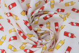 Swirled swatch ketchup & mustard fabric (off white fabric with tossed cartoon bottles of ketchup and mustard in red and yellow)