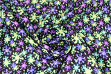 Swirled swatch Splat fabric (black fabric with bright green, purple and blue splat shapes allover)