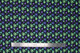 Flat swatch Splat fabric (black fabric with bright green, purple and blue splat shapes allover)