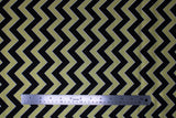 Flat swatch Gold Chevron fabric (medium thick chevron striped fabric alternating black and gold with metallic/sparkle effect, thin white edges on stripes)