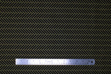 Flat swatch Gold Lines Black fabric (black fabric with alternating diagonal rectangles in gold with sparkle/metallic effect comprising herringbone/brick like chevron pattern allover)