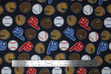 Flat swatch of baseball print fabric on grey (charcoal grey fabric with tossed white baseballs, brown and tan baseball gloves, red and blue "#1" foam fingers)