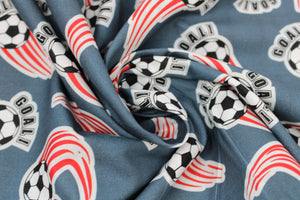 Soccer ball printed fabric swatches in various colours