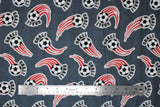 Flat soccer ball printed fabric swatch in grey (medium grey fabric with black/white soccer balls with sport swoosh lines in blue and "GOAL!" text in black)