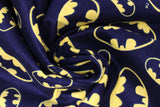 Swirled swatch batman logo (black) fabric (black fabric with tossed yellow batman logo in various sizes)
