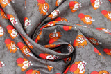Swirled swatch Pennywise Peekaboo fabric (grey fabric with pennywise character heads allover)