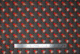 Flat swatch Pennywise Peekaboo fabric (grey fabric with pennywise character heads allover)