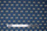 Flat swatch Regan Peekaboo fabric (blue fabric with regan character heads allover)