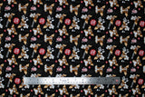 Flat swatch Gremlins Rules fabric (black fabric with tossed gremlin characters and text allover)