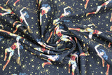 Swirled swatch Wonder Woman fabric (black fabric with gold stars and Wonder Woman character tossed allover with golden lasso)