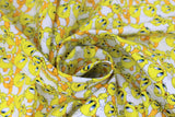 Swirled swatch Tweety Expressions fabric (white fabric with tossed full colour tweety birds allover in various poses)