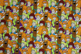 Flat swatch Scooby Doo & The Gang fabric (full colour collaged characters allover on white background)