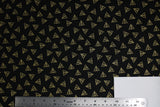 Flat swatch Deathly Hallow Logo fabric (black fabric with tossed small gold deathly hallows triangle emblems allover)