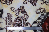 Flat swatch Marauders Map fleece (off white scroll look fabric with Marauders Map emblems from Harry Potter movie)
