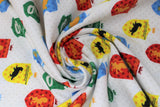Swirled swatch licensed Harry Potter flannel (house crests on white with faint polka dots)