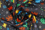 Swirled swatch snowflake houses fabric (black fabric with deconstructed christmas sweater look design, tossed digitized look snowflakes and HP house emblems in yellow, blue, green and red)