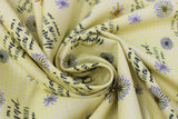 Swirled swatch Daisies fabric (light yellow fabric with thin white tiled background design, tossed illustrative style daisy heads and "I love you a thousand yellow daisies" "Gilmore girls" text)