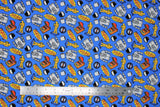 Flat swatch Jerry Icons Toss fabric (blue fabric with tossed seinfeld logo, no tooth sign, yellow suit, coffee mug, ruffle shirt, etc.)