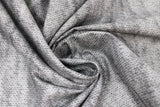 Swirled swatch dark grey knit fabric (dark grey knit look fabric with subtle black accents)