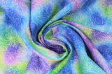 Swirled swatch watercolour leaf fabric (light blue, blue, purple, light and dark green marbled/watercolour look fabric with faint white floral and leaves outlines)