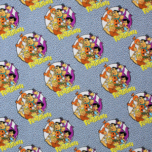 Square swatch The Flintstones fabric (grey small leopard print fabric with circular 'The Flinstones' badges in white with full colour characters within (entire family))